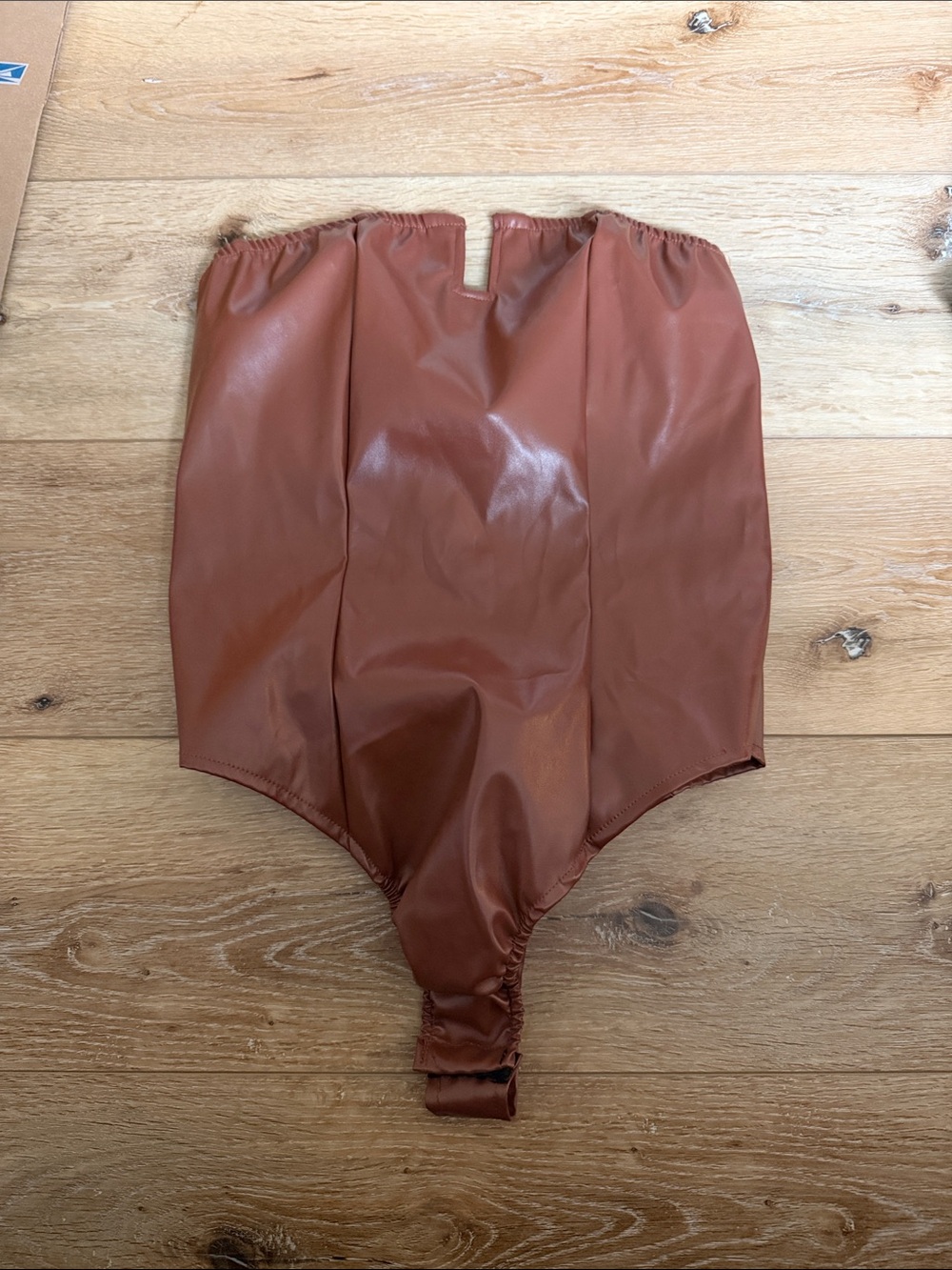 PrettyLittleThing Rust Brown Faux Leather Strapless Bodysuit